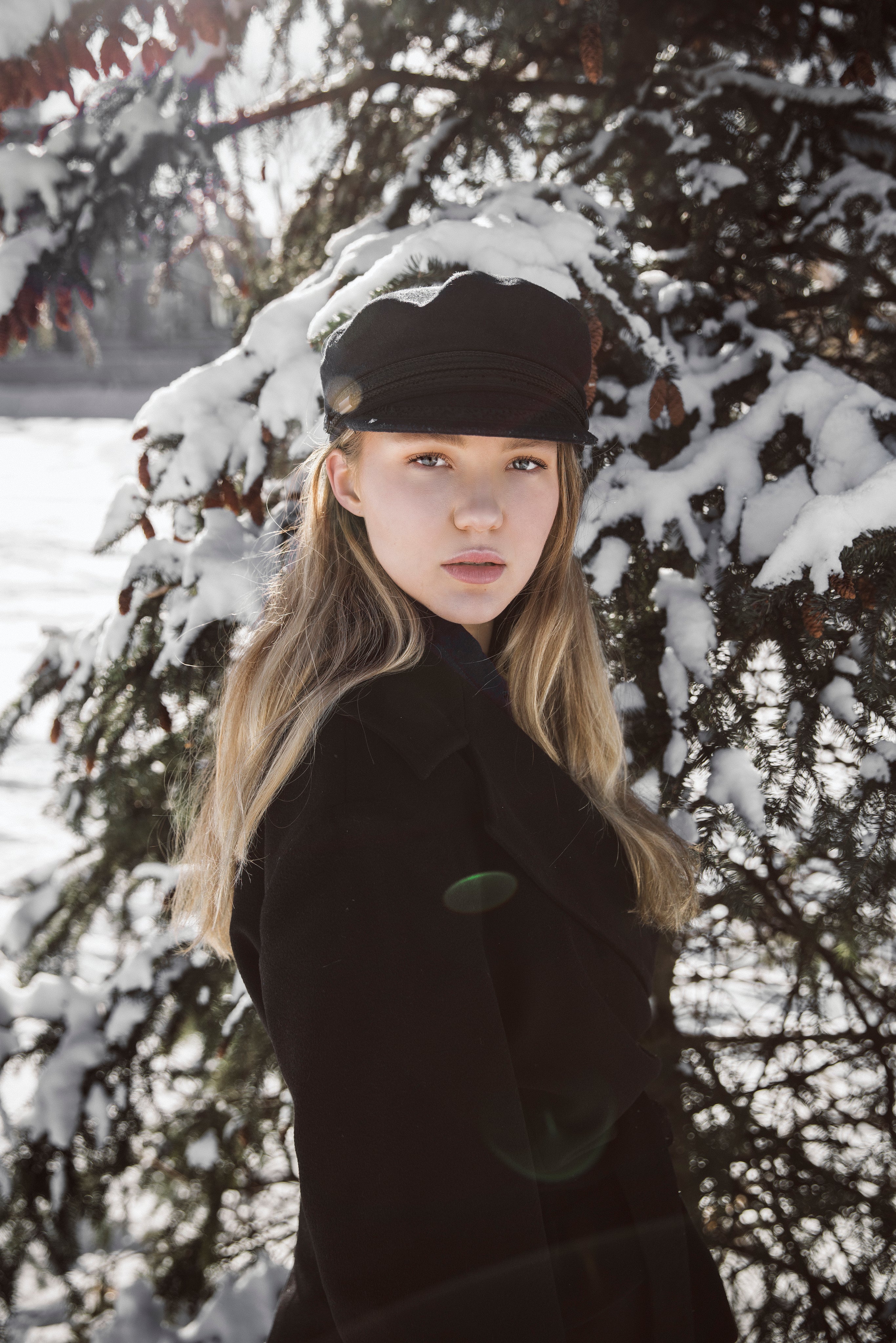 blond-woman-with-winter-pine.jpg